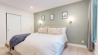 a bedroom with a large bed with white sheets at St, Moritz 34 Cozy Centrally Located Condo With Great Complex Amenities condo in Mammoth Lakes