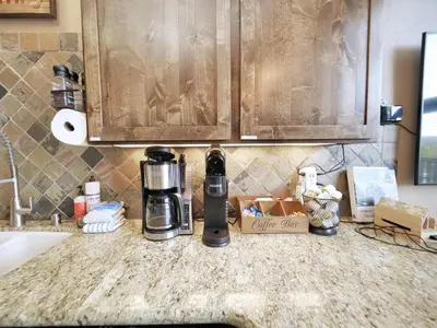 a coffee maker sitting on a counter next to a sink at Kirkwood Mountainside Cabin & Cottage Deck wViews in Kirkwood