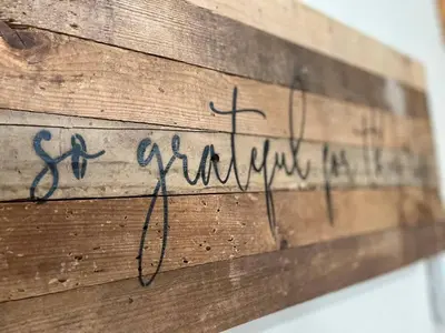 a piece of wood with writing on it at The Meadows-Cozy Family Condo in Kirkwood Deck in Kirkwood