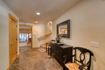 a home office with a black desk and chairs at Kindred Pines at Tahoe Donner by Tahoe Getaways - 3BR with Pool Table & HOA in Truckee