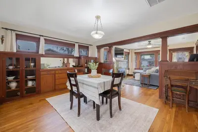 a kitchen and dining room with a table and chairs at 2 bed1 bath, historic beauty, walk downtown in Visalia