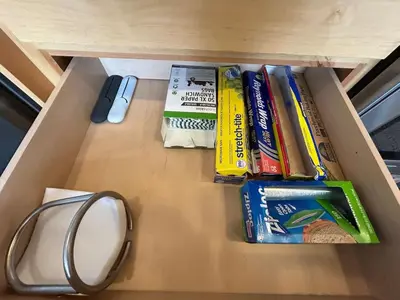 a drawer filled with books and a mouse and a keyboard at Kirkwood Resort between Village & Timber Creek in Markleeville