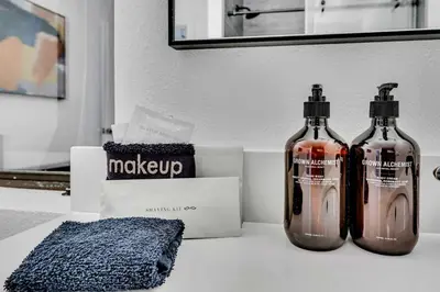 two bottles of alcohol sitting on top of a counter at Tahoe Retreat - Private Hot Tub & Scenic Views in Incline Village