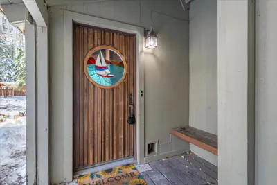 a door with a picture of a boat on it at Dollar Point - Observation Dr, home in Tahoe City