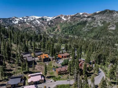 an aerial view of a lodge in the mountains at Alpine Meadows Basecamp in Alpine Meadows