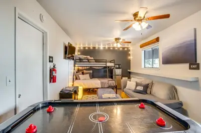 a living room with a ping pong table in a room at Modern Heavenly Ski Resort Mountain-Top Retreat in Stateline