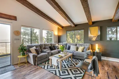 a living room with a couch and a table at Modern Heavenly Ski Resort Mountain-Top Retreat in Stateline