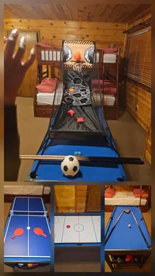 a room with a table with a soccer ball on it at The Cozy Knotty Pine Enchantment Retreat in Long Barn