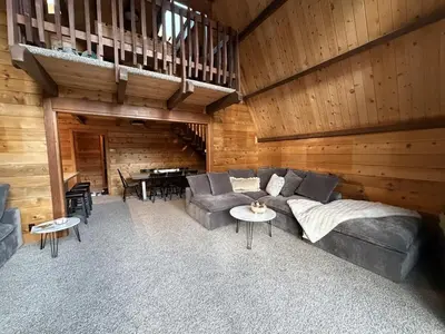 a living room with a couch and a table at Three Bears Getaway Tahoe in Kings Beach