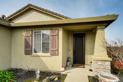 a house with a brown door at Sophisticated Sanctuary 8 Mi to Lodi Wineries! in Stockton