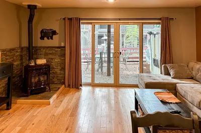 a living room with a couch and a fireplace at Incline Village Creekside Retreat in Incline Village