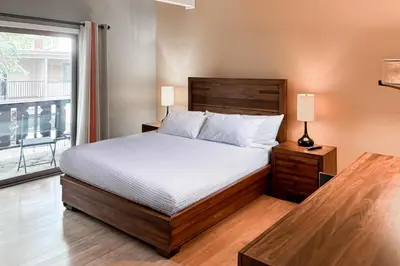 a bedroom with a bed and a large window at Incline Village Creekside Retreat in Incline Village