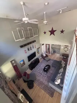 an aerial view of a living room with stars on the wall at The Firehouse Inn-Cottage in Mariposa