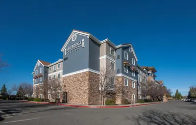 a rendering of the front of a hotel at Staybridge Suites Rocklin - Roseville Area by IHG in Rocklin