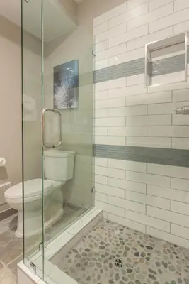 a bathroom with a glass shower with a toilet at Snowcreek #881 - Phase V in Mammoth Lakes