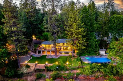 an aerial view of a house with a pool at Mountain Shadows Retreat in Foresthill