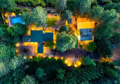 an overhead view of a house with a garden and lights at Mountain Shadows Retreat in Foresthill
