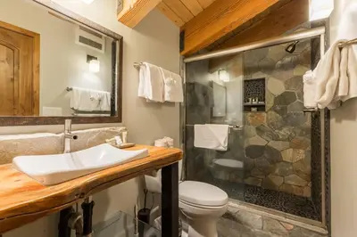 a bathroom with a sink and a shower at Village Treehouse #2 in Mammoth Lakes
