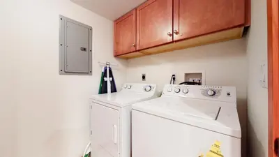 a laundry room with a washer and dryer at Snowcreek 1005 Apartment in Old Mammoth