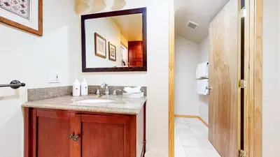 a bathroom with a sink and a mirror at Snowcreek 638 Apartment in Old Mammoth