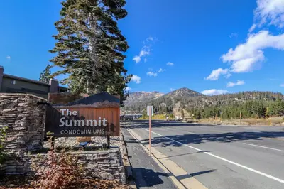a sign for the summitcountry sign next to a road at Summit 211 Apartment in Mammoth Lakes