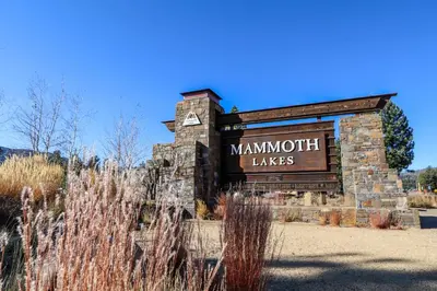 a sign for the mannum takes sign at a park at Mammoth Reservations in Mammoth Lakes