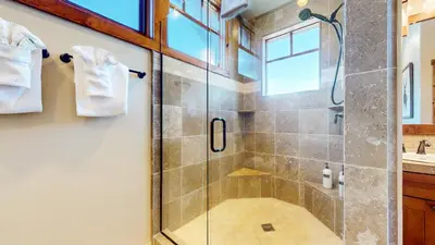 a bathroom with a shower and a glass shower stall at Gray Stone 2088 Holiday home in Mammoth Lakes