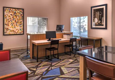 an office with desks and chairs and a computer at Holiday Inn Express Reno Airport by IHG in Reno