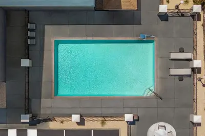 an overhead view of a swimming pool at Holiday Inn Express Fresno River Park Highway 41 by IHG in Fresno