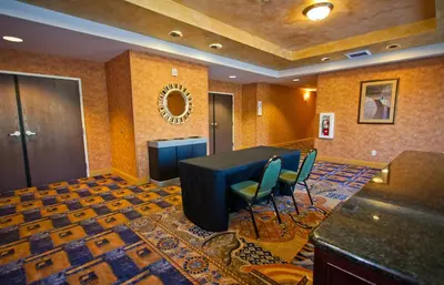 an office with a table and chairs in a room at Holiday Inn Express & Suites Sacramento NE Cal Expo by IHG in Sacramento