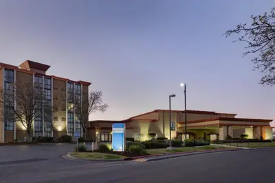 a rendering of the exterior of a hotel at Wyndham Sacramento in Sacramento