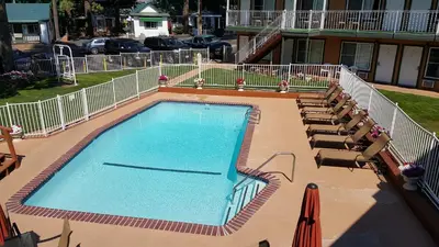 an overhead view of a swimming pool with chairs at Alpine Inn & Spa in South Lake Tahoe