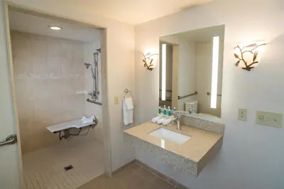 a bathroom with a sink and a shower at Holiday Inn Express South Lake Tahoe by IHG in South Lake Tahoe