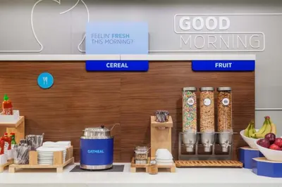 a grocery store with food items on a shelf at Holiday Inn Express & Suites Yosemite Park Area by IHG in Chowchilla