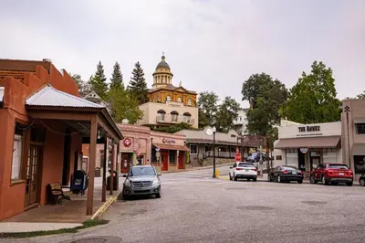 a street in a small town with a building at Holiday Inn Auburn by IHG in Auburn