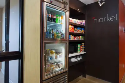 a refrigerator filled with lots of food and drinks at Courtyard by Marriott Roseville in Roseville