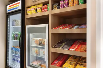 a refrigerator filled with lots of food and drinks at Residence Inn Sacramento Folsom in Folsom