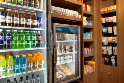 a refrigerator filled with lots of different types of drinks at Fairfield Inn by Marriott Roseville in Roseville