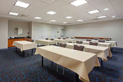 a conference room with tables and chairs in it at Hampton Inn & Suites Clovis Airport North in Clovis