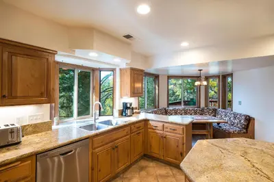 a kitchen with a sink and a counter top at Four Seasons in Yosemite West