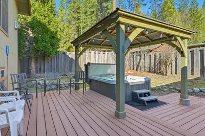 a gazebo with a hot tub on a deck at Apple Tree Bear House in Yosemite West