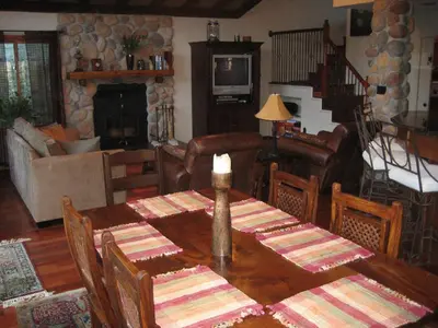 a living room with a table with a candle on it at Alta Peak Vista in Three Rivers
