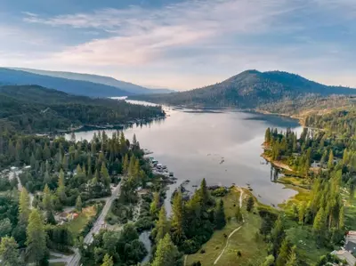 an aerial view of a lake in the mountains at WorldMark Bass Lake in Bass Lake