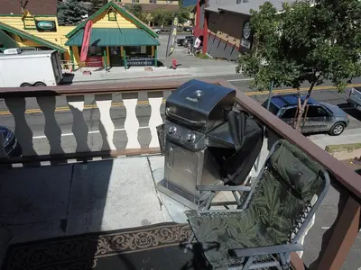 a trash can sitting on the side of a balcony at Rainbow Ridge B - 1BR/1BA in June Lake