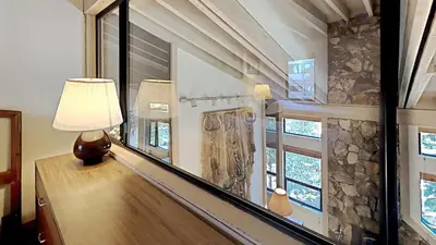 a room with a bowling alley in a house at Comfortable 4 Bedroom Condo in Mammoth Lakes