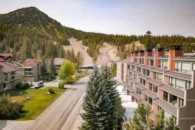 an empty street in a town with a mountain at Spacious 2 Bedroom Condo in Mammoth Lakes
