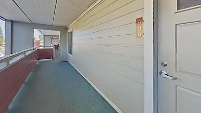 a hallway of a house with a door at Comfortable Cozy 2 Bedroom Condo with Loft! in Mammoth Lakes
