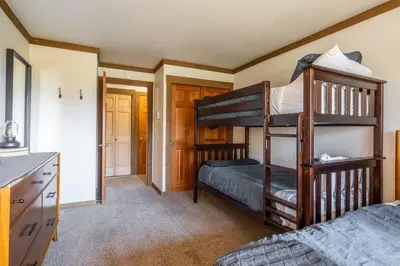 a bedroom with two bunk beds in a room at Mountainback 15 in Old Mammoth