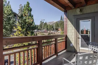 a balcony with a view of the mountains at Village 3321 in Mammoth Lakes