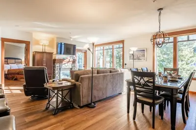 a living room with a couch and a table at Village 3321 in Mammoth Lakes